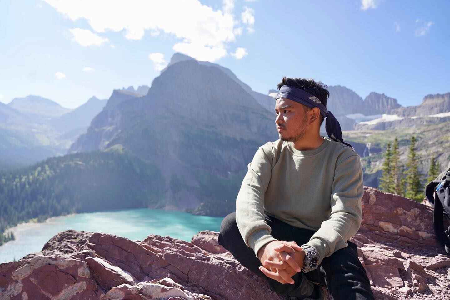 A Fellow staring out at a lake in Glacier National Park