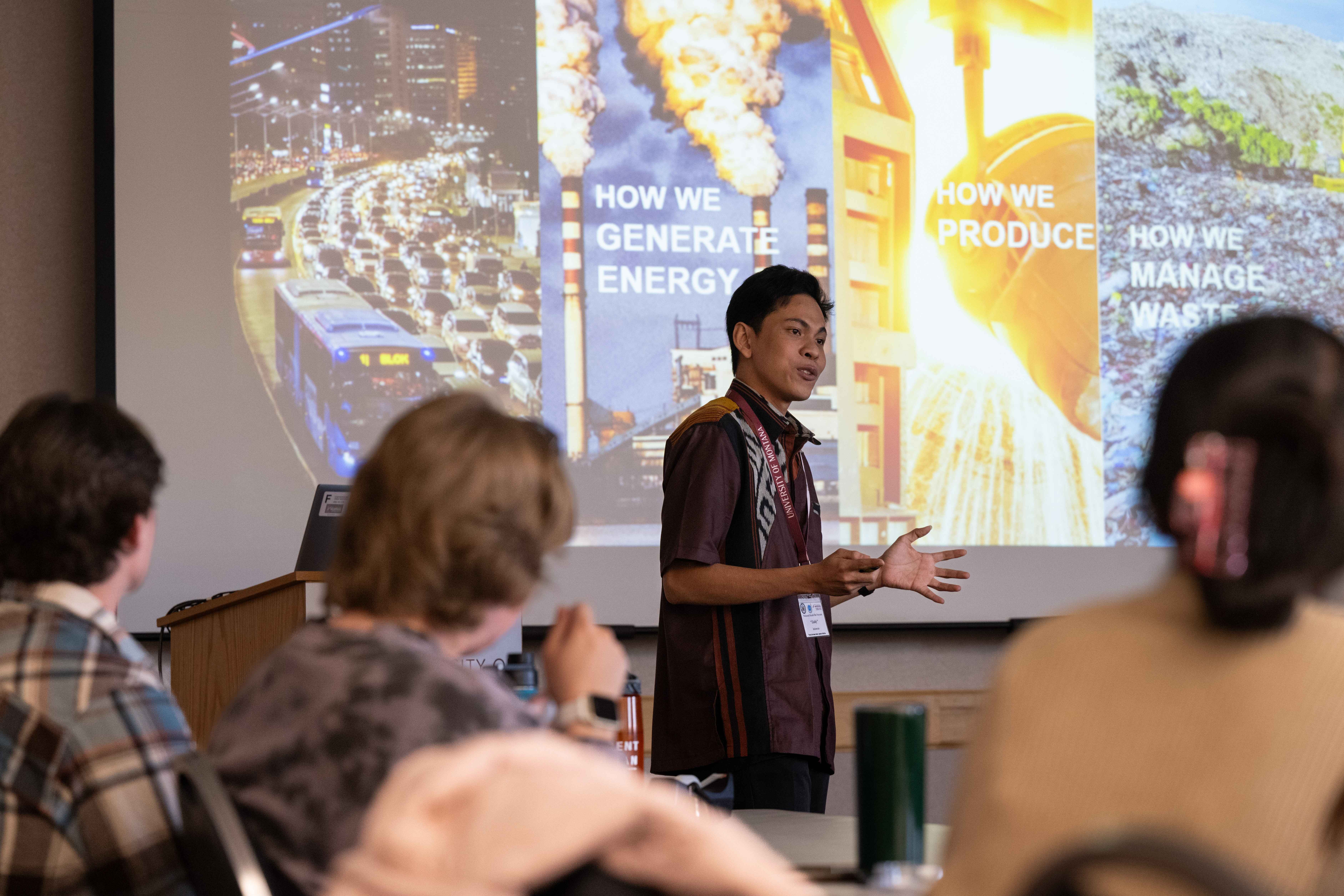 A man giving a speech about different energy sources